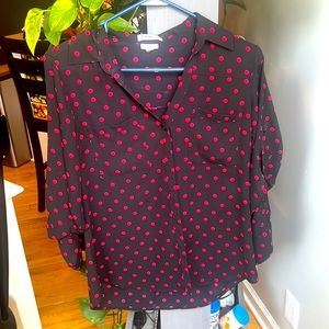 Black blouse with red pockadots.